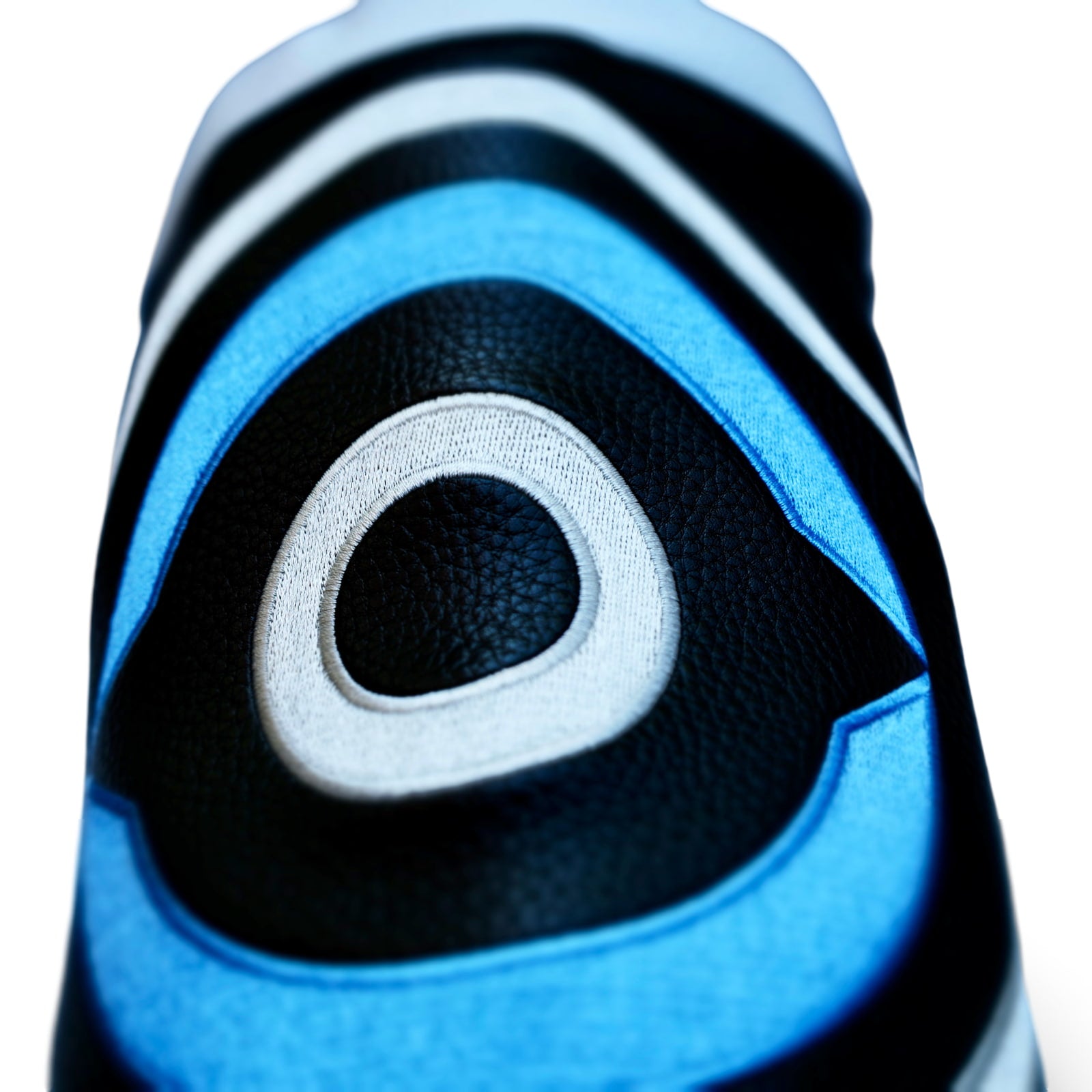 Angled shot highlighting stitched layers and premium leather texture of the Fore Eye headcover.