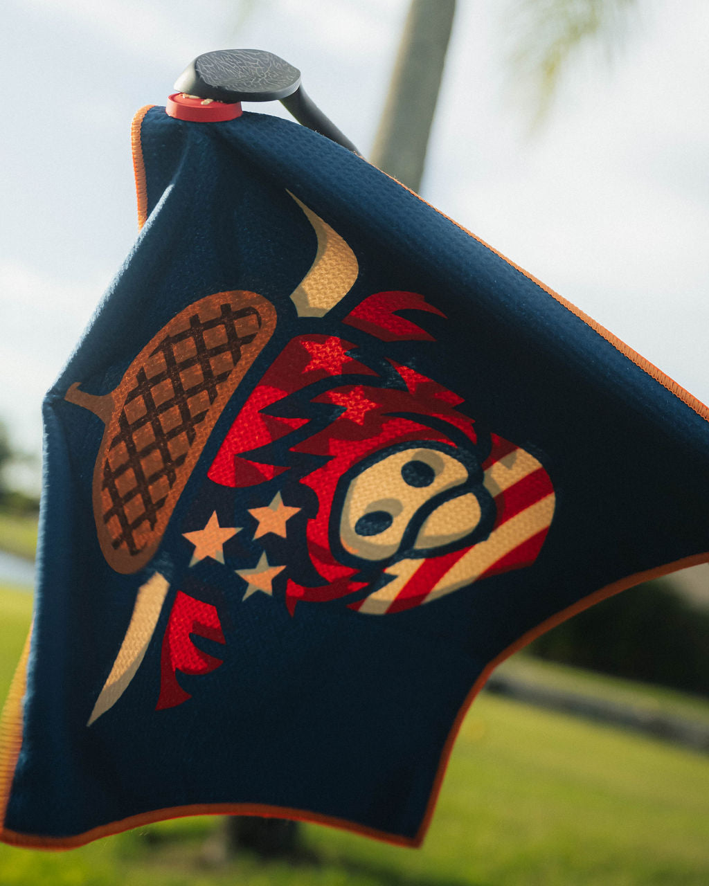 Caddy Collective Culture Oakmont 2025 microfiber golf towel with built in magnet attached on club