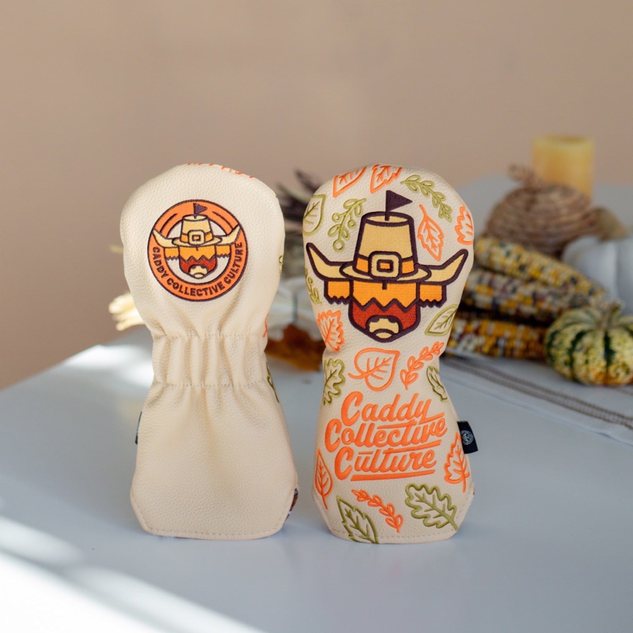 Pilgrim Looper fairway headcover by Caddy Collective Culture displayed in a clean fall-themed lifestyle scene.