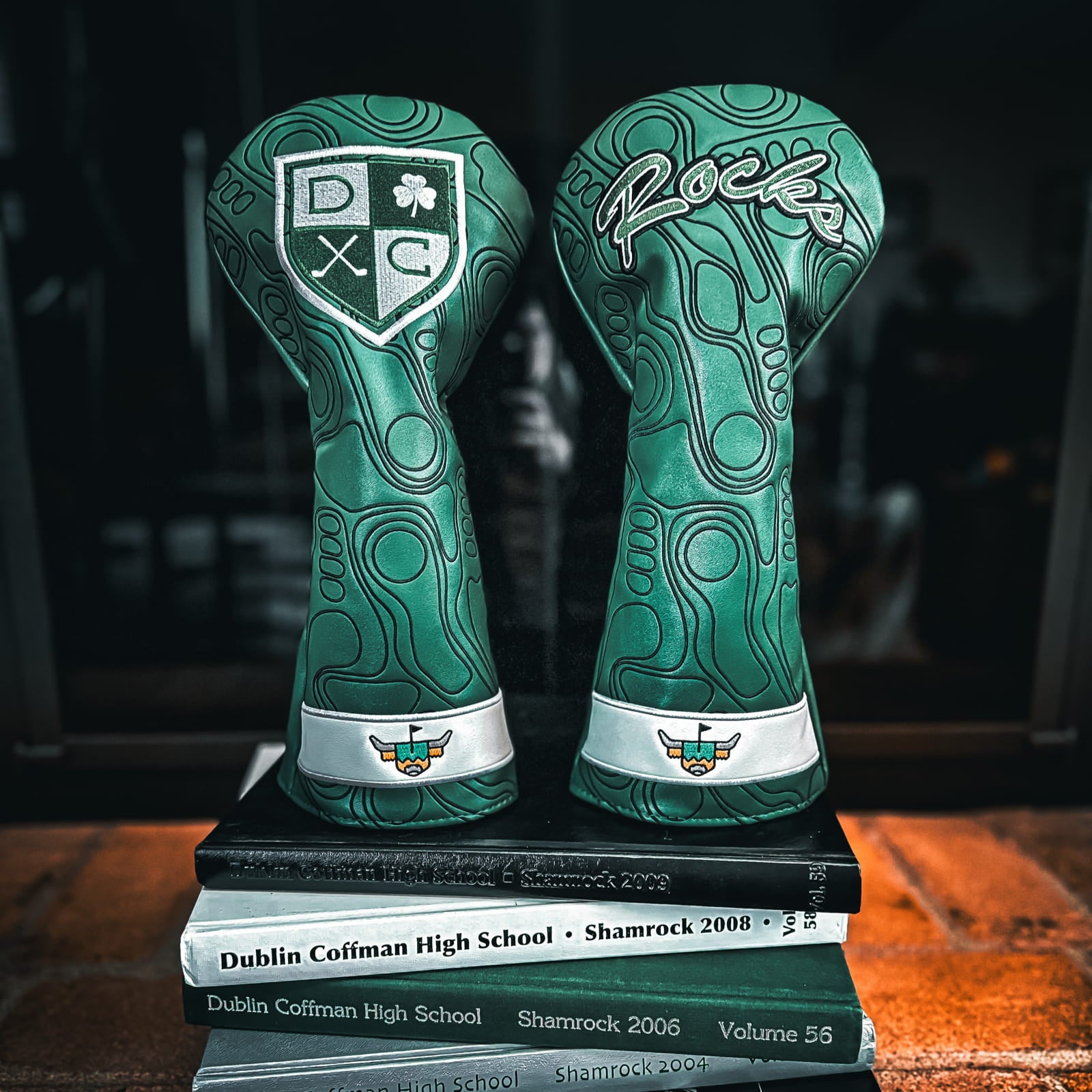 Dublin Coffman High School custom golf headcovers in green and black by Caddy Collective Culture.