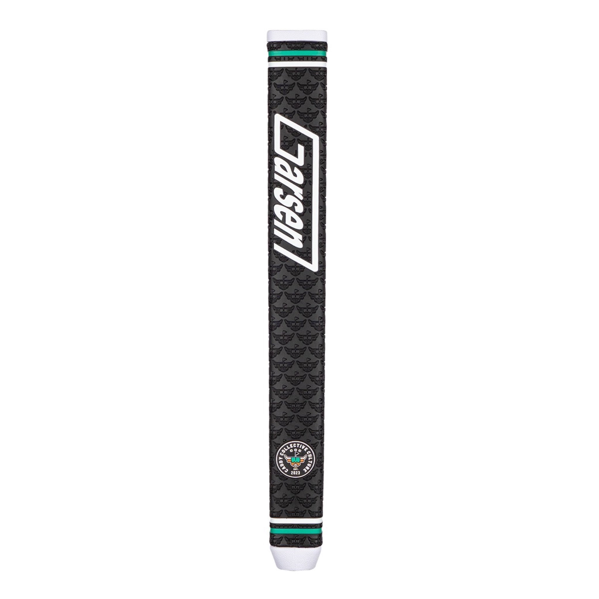 Front product shot of a black Garsen QUAD Tour putter grip with a large white Garsen logo, Caddy Collective Culture badge, embossed pattern, green accent rings, and white end caps.