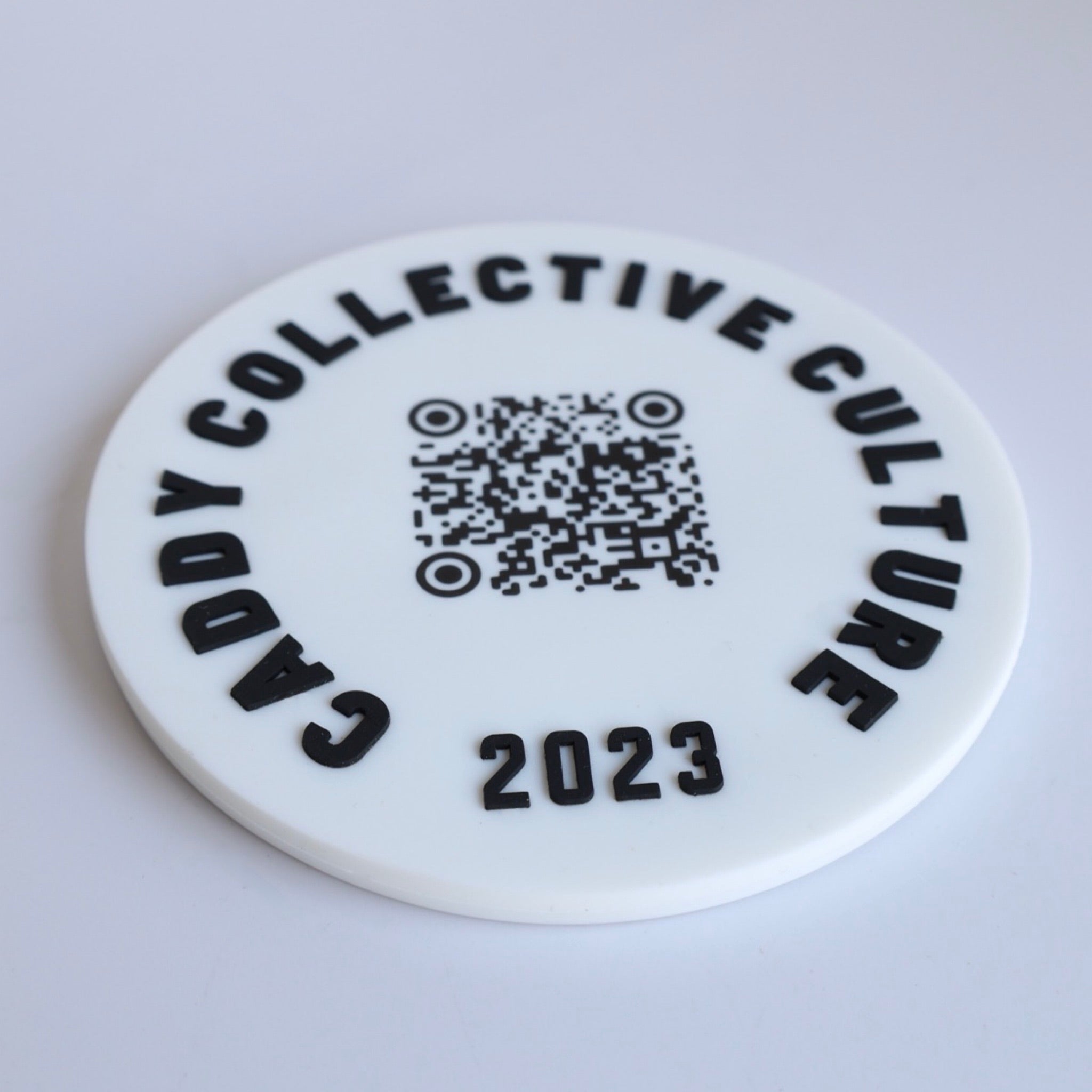 Looper Practice Disc white side with QR code dual sided golf coaster and putting target