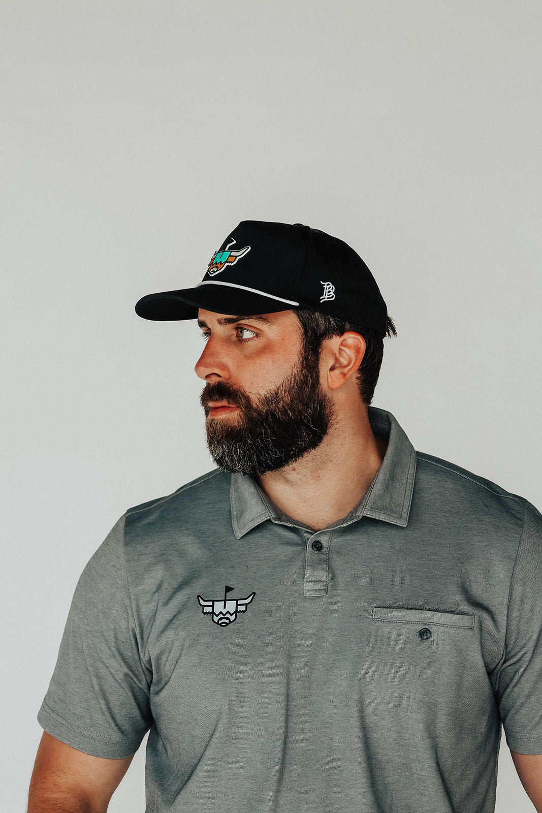 Side view of model wearing the Looper Rope Hat, showing brim, rope, and side profile.