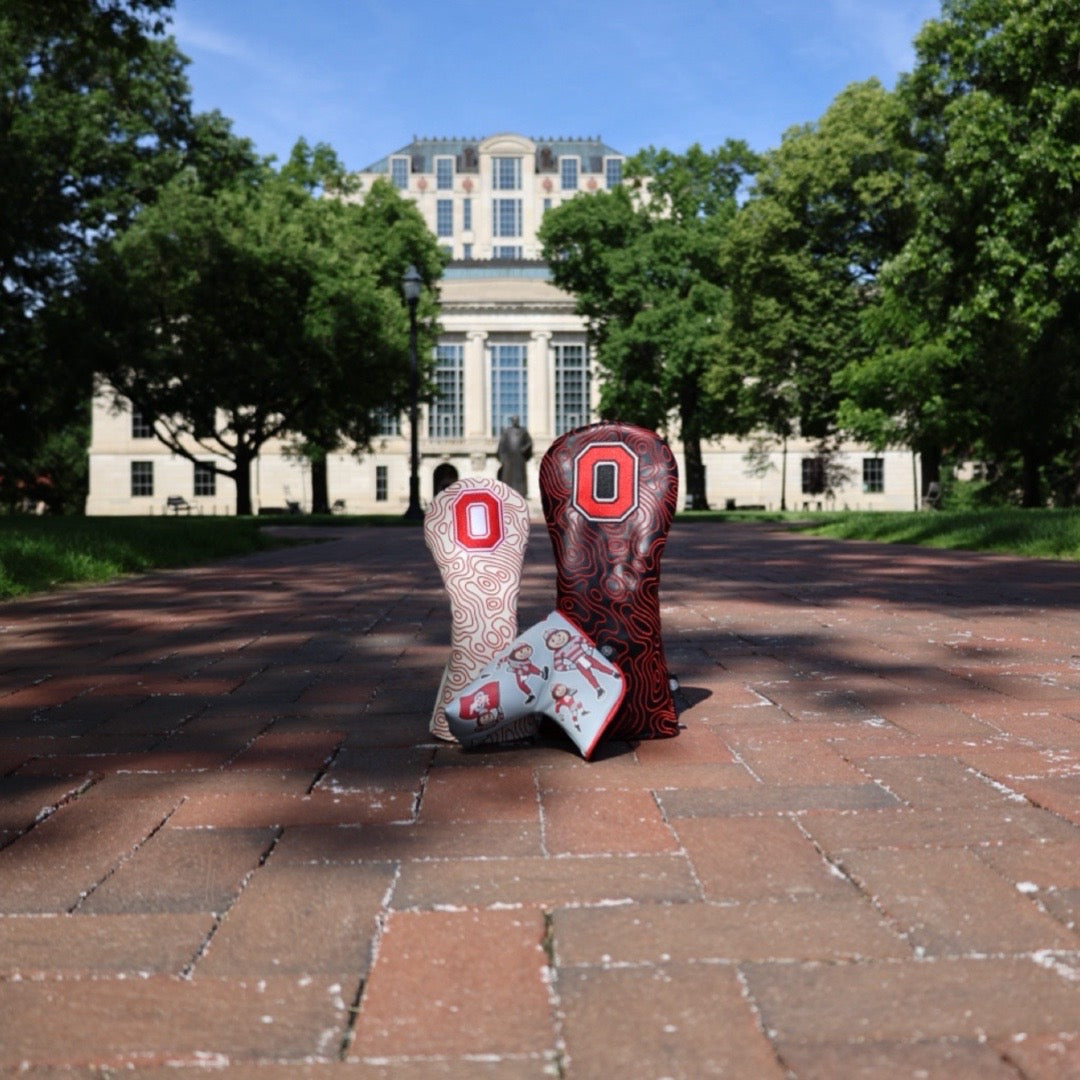 Ohio State golf headcovers photographed on campus with Brutus putter cover and Block O designs