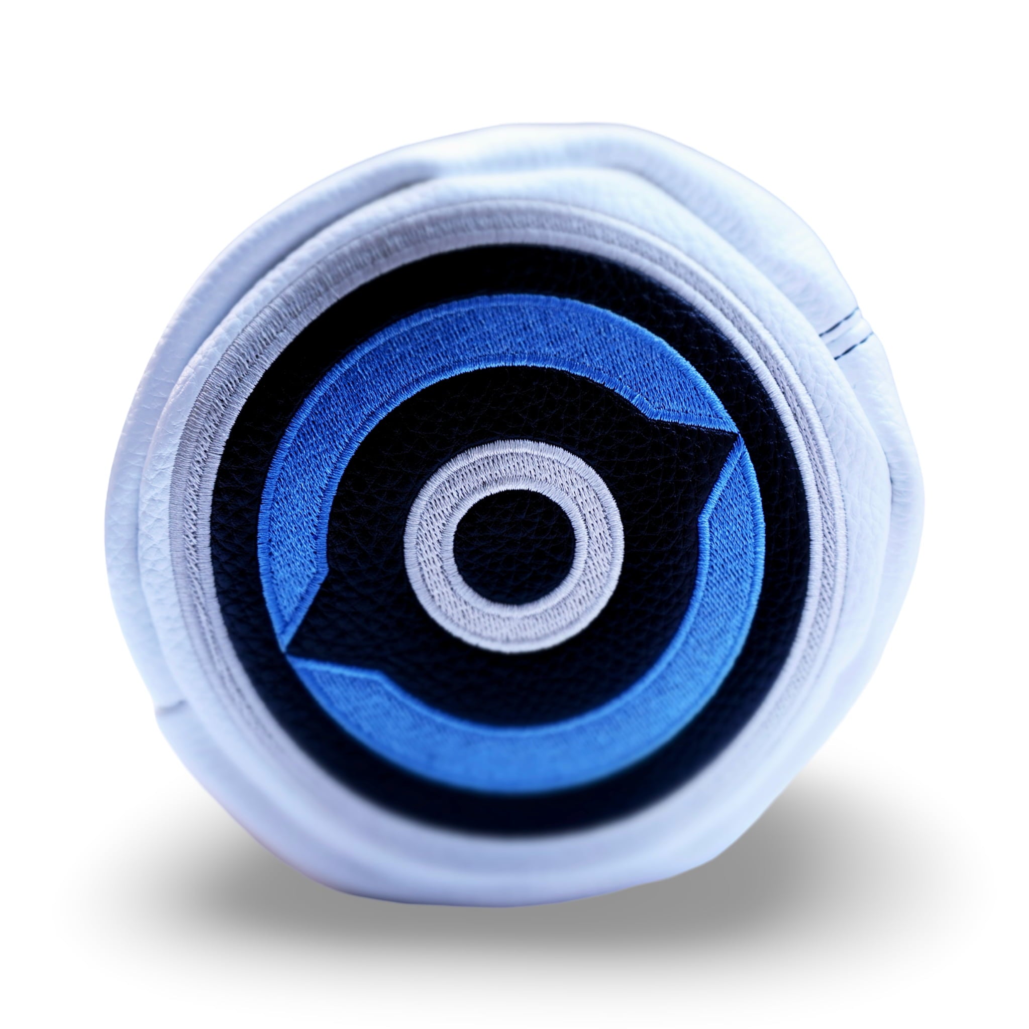 Detailed close-up of the Fore Eye headcover showing embroidery precision and pebble leather texture.
