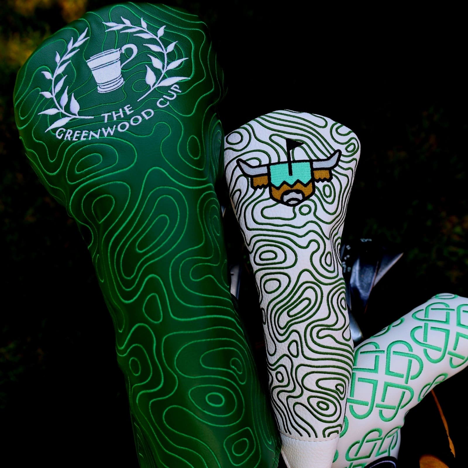 Caddy Collective Culture x River Oaks Country Club Greenwood Cup driver headcover featuring green topographic pattern and embroidered trophy design.