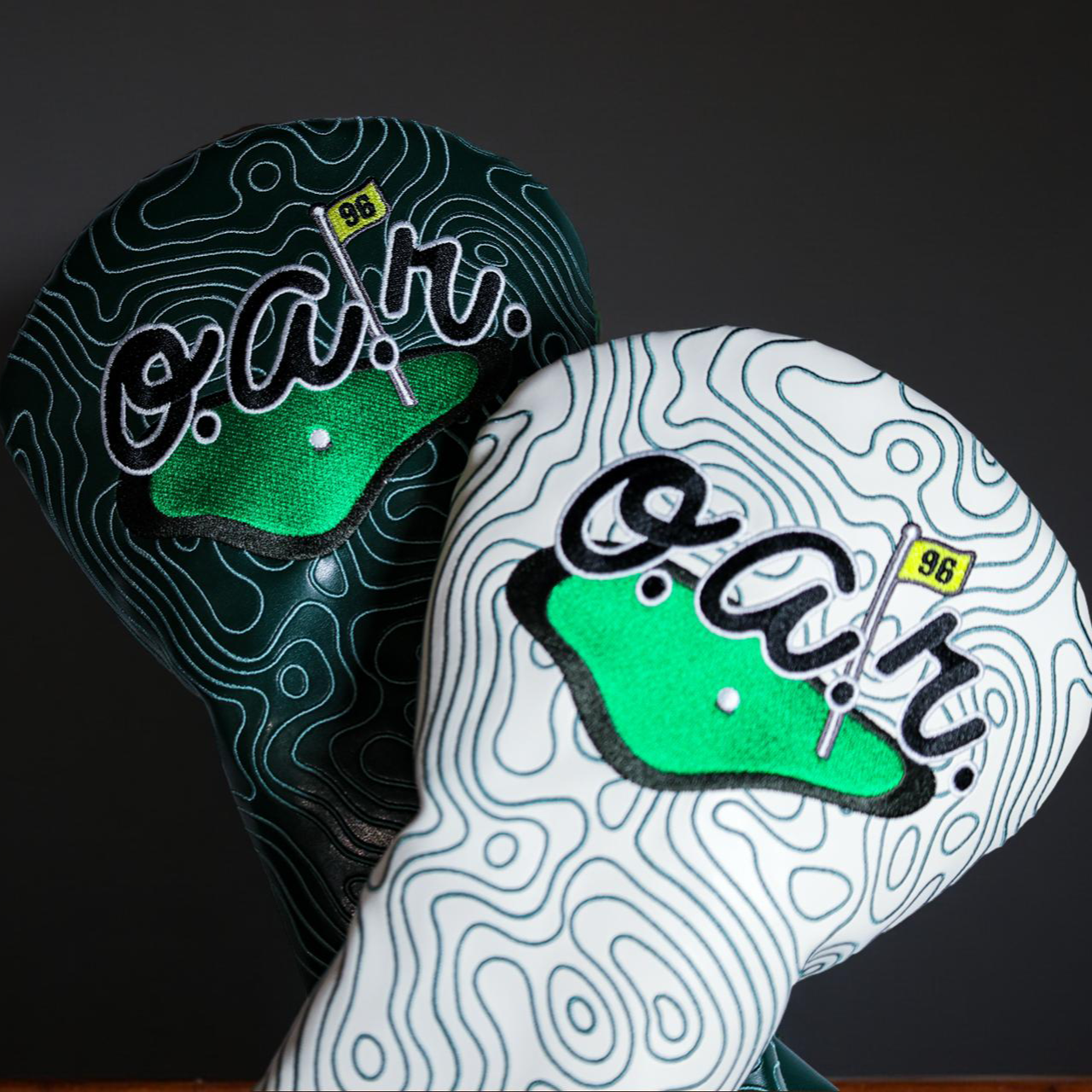 O.A.R. x Caddy Collective Culture custom golf headcovers and divot tool collaboration.
