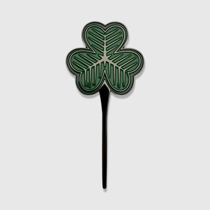 Premium green shamrock divot tool with black stem by Caddy Collective Culture, inspired by St. Patrick’s golf tradition
