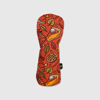 Autumn Feast hybrid golf headcover by Caddy Collective Culture featuring Thanksgiving food illustrations on an orange background.