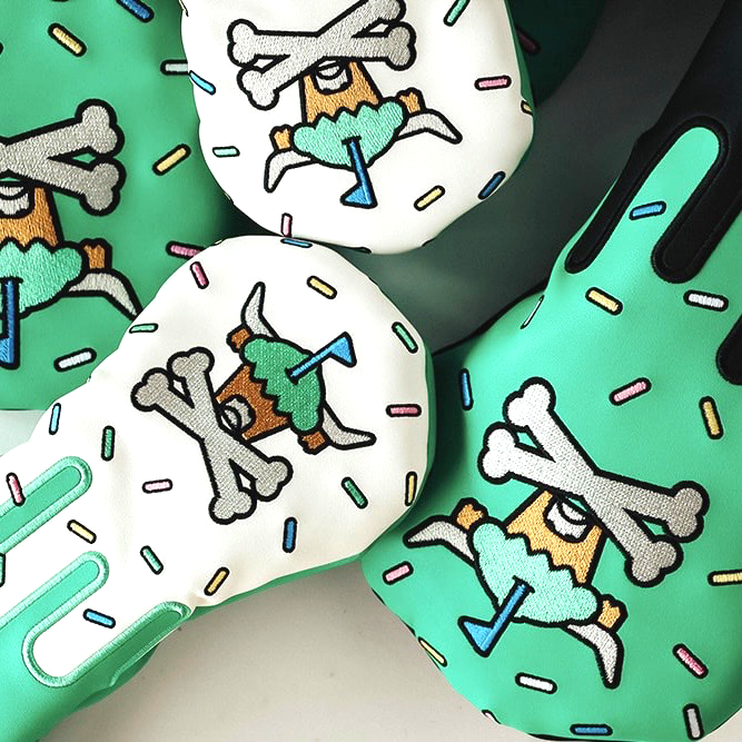 Confetti Looper hybrid golf headcover shown with other CCC x Johnny Cupcakes headcovers
