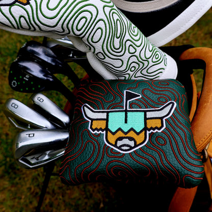 Green topography mallet putter headcover on golf bag with clubs, paired with white topography headcover