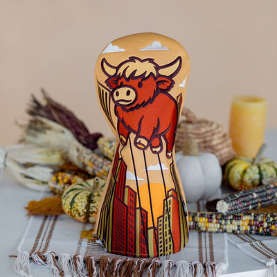 Harvest Parade driver headcover on a clean backdrop with subtle fall decor, showing the full design.