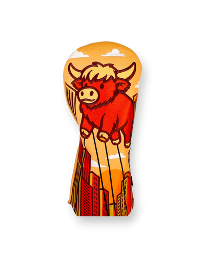 Harvest Parade driver headcover with illustrated Looper character and autumn cityscape design by Caddy Collective Culture
