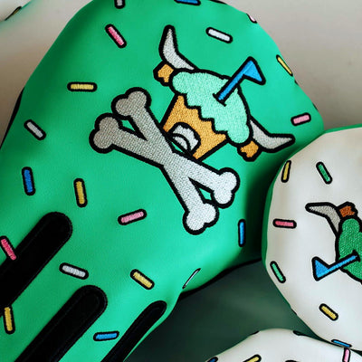 Close-up of Signature Frost driver headcover embroidery with sprinkles and frosting drip