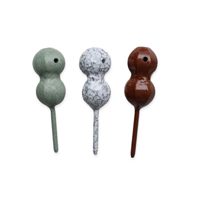 Stackhouse single prong divot tools shown in three material finishes with sculptural form by Caddy Collective Culture