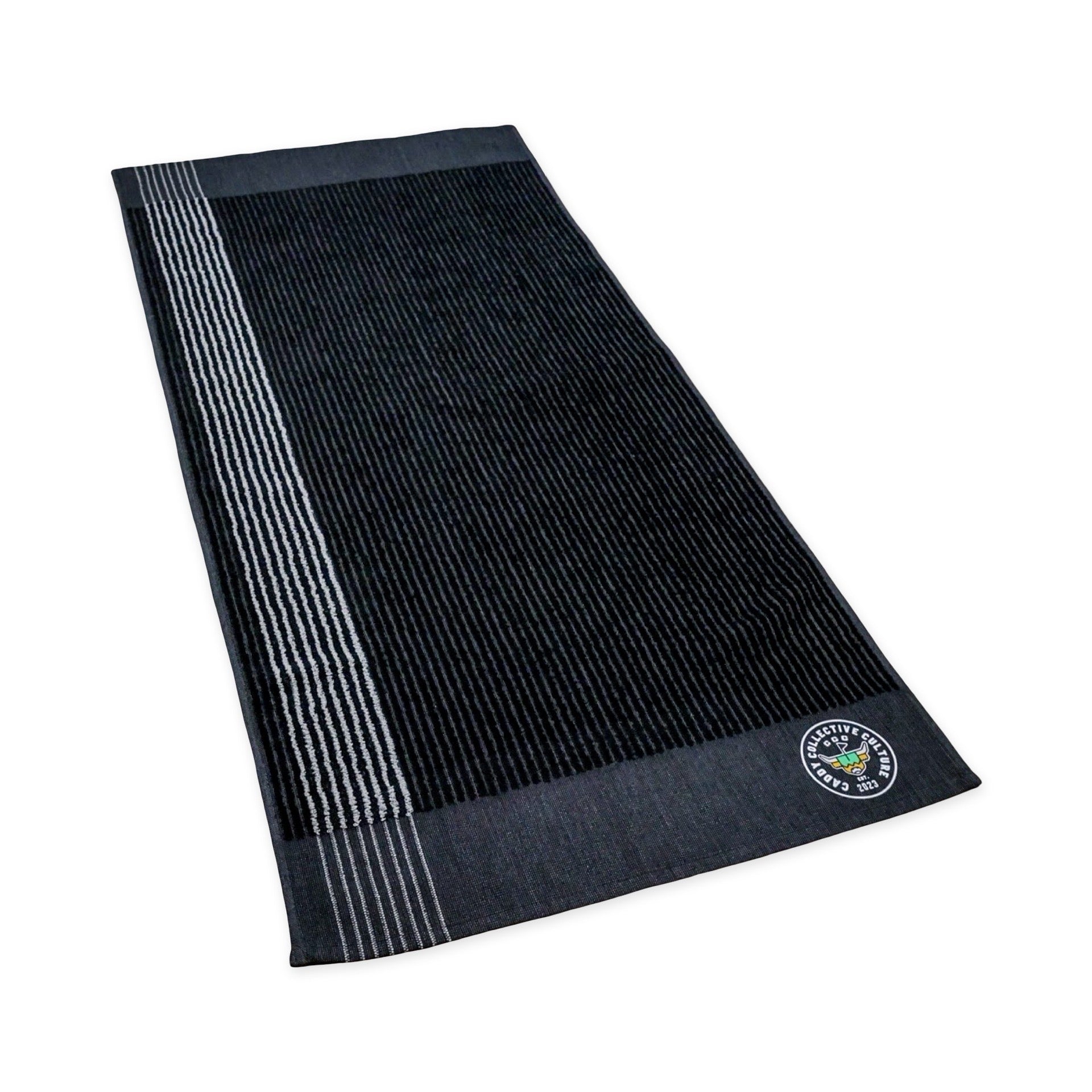 Black CCC Tour Caddy Towel laid flat showing full ribbed surface