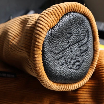 Close-up detail of the Corduroy Barrel Fairway Wood Headcover showcasing premium mustard corduroy texture and charcoal pebbled leather.