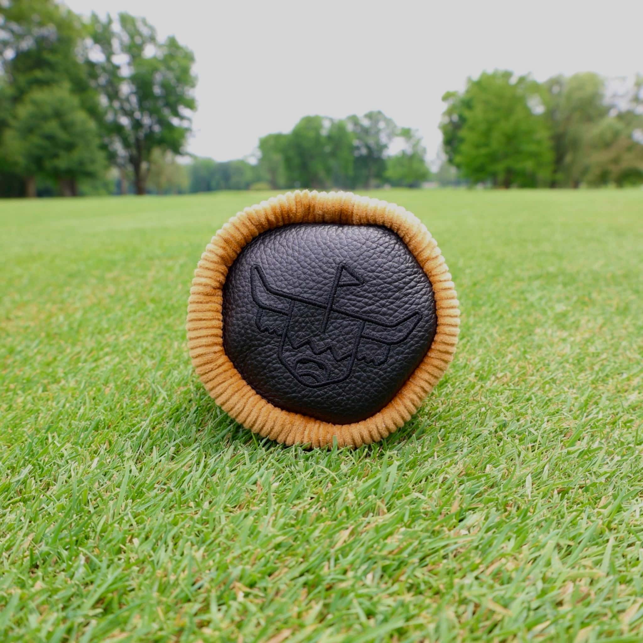 Front detail of the Corduroy Barrel Fairway Wood Headcover featuring mustard corduroy and charcoal leather with embroidered logo.