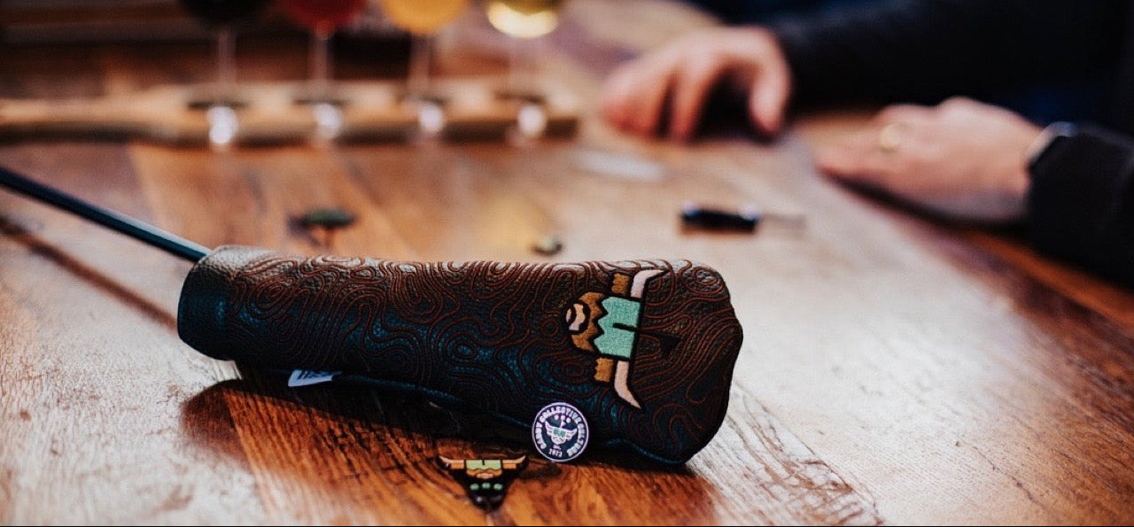 Custom golf merchandise by Caddy Collective featuring premium leather headcovers and golf accessories designed for golf clubs, brands and tournaments.