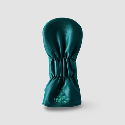  Back view of the Evergreen Drop driver headcover with Caddy Collective Culture branding.