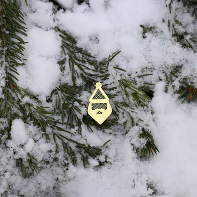 Studio image of the Santa Silhouette ball marker on a clean gray background.