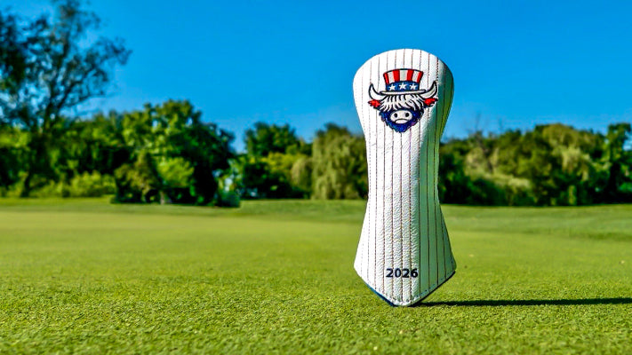 Founders Collection leather golf headcover by Caddy Collective displayed on a golf course featuring an embroidered patriotic Highland cattle design inspired by American heritage.