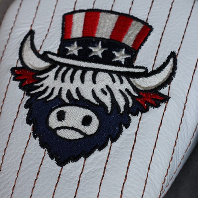 Detailed embroidery view of Uncle Sam Looper logo on The Founder Fairway Cover