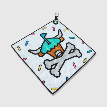 Caddy Collective x Johnny Cupcakes magnetic microfiber golf towel with cupcake skull design and sprinkles