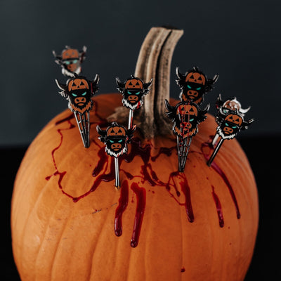 Looper After Dark divot tools displayed on pumpkin with Halloween theme