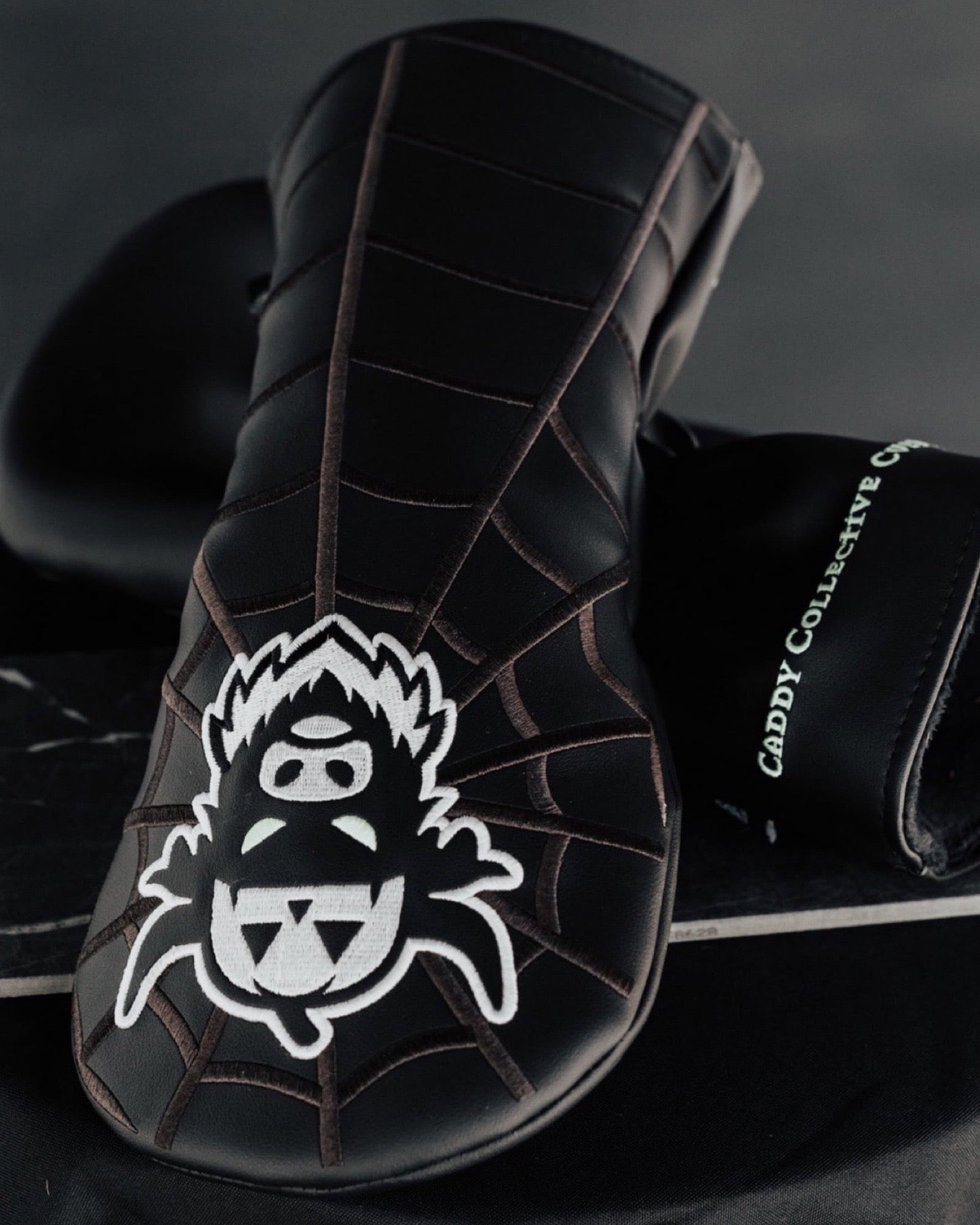 Looper After Dark Halloween golf headcover collection featuring black spiderweb headcovers by Caddy Collective Culture