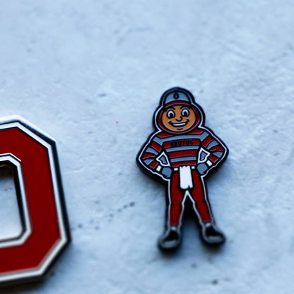 Close-up detail of Ohio State Brutus full-body golf ball marker