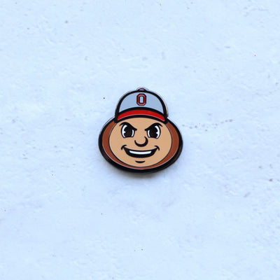 Ohio State Brutus Head Grit golf ball marker shown on light background
