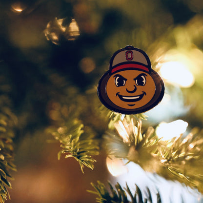 Ohio State Brutus Head Grit ball marker displayed in a lifestyle setting