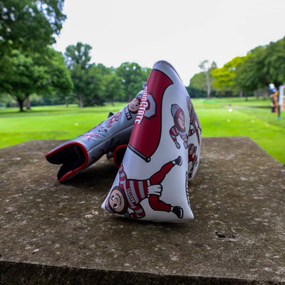Close-up of the Ohio State Brutus blade putter headcover featuring repeating Brutus Buckeye graphics and official Ohio State branding.