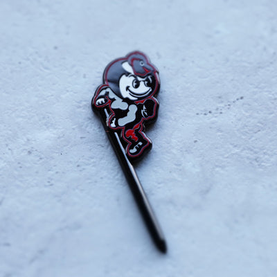 Angled view of Ohio State Heritage Brutus single-prong divot tool