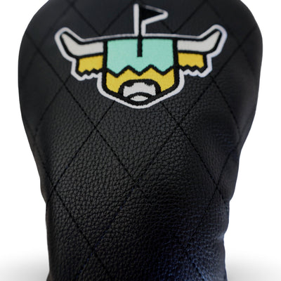 Close-up of the Quilted Heritage Leather Driver Headcover showing premium black pebbled leather, diamond quilt stitching, and embroidered Looper logo.