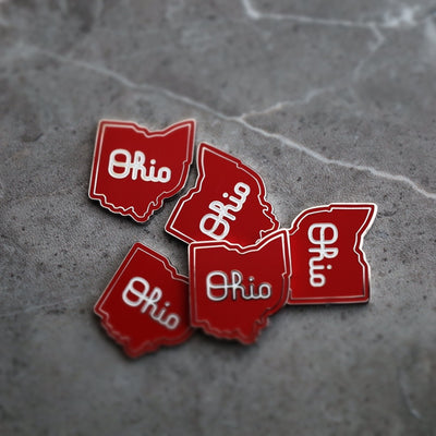 Single Script Ohio golf ball marker shaped like the state of Ohio in red enamel
