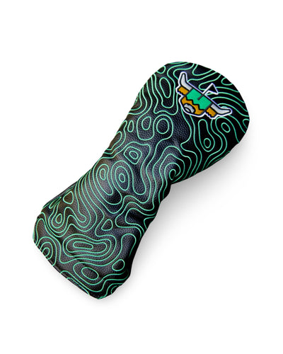Angled product view of the Terrain Driver Headcover – Midnight showcasing black pebbled leather with a green embroidered topographic design.