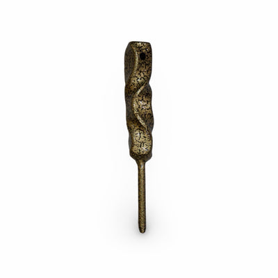 Twisted Column golf divot tool with sculpted forged steel body and antique gold finish.